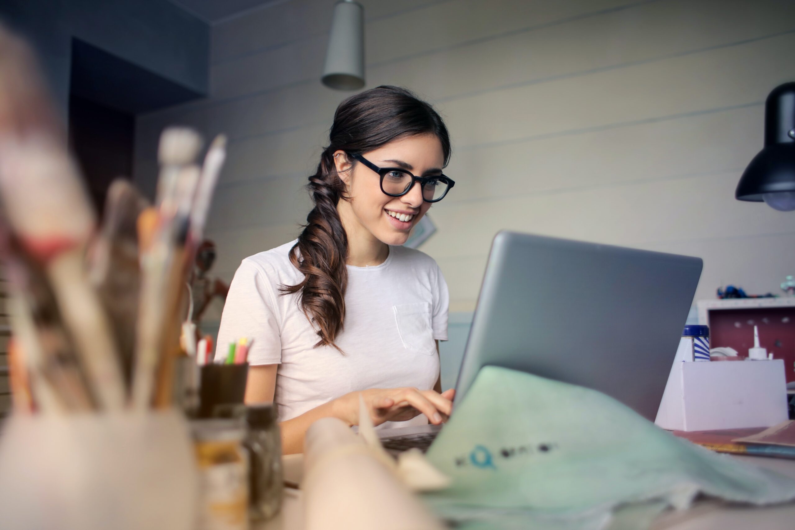 young woman using laptop