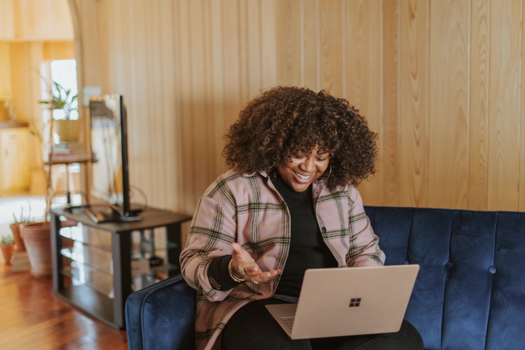 The Mentor Apprentice role can take place online, with a person sitting on a chair during a remote call using their laptop